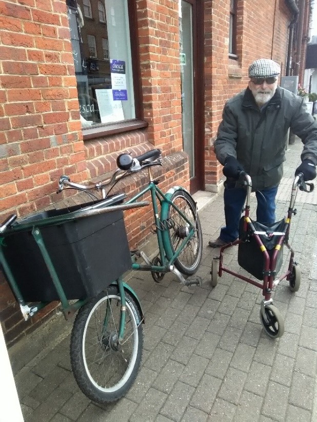 Photo of dad with walker by bike