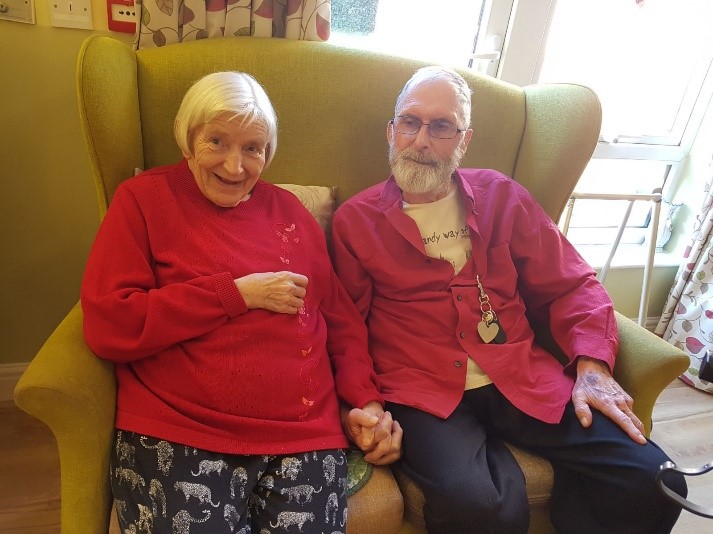Photo of mum and dad on sofa in Holmers House