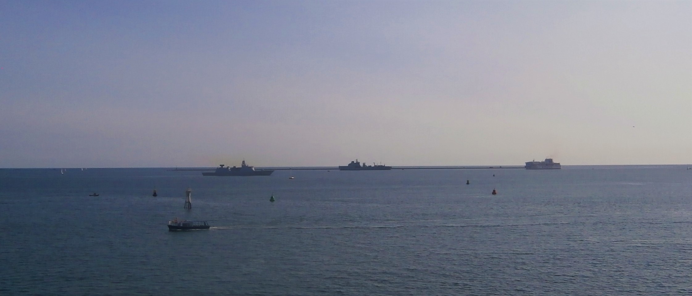 Photo of some ships on the horizon