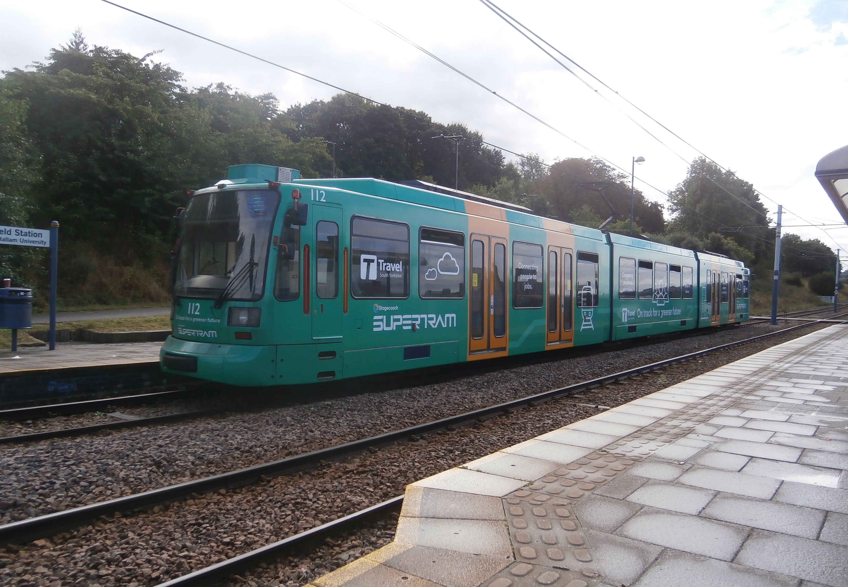 Photo of green supertram at Sheffield station