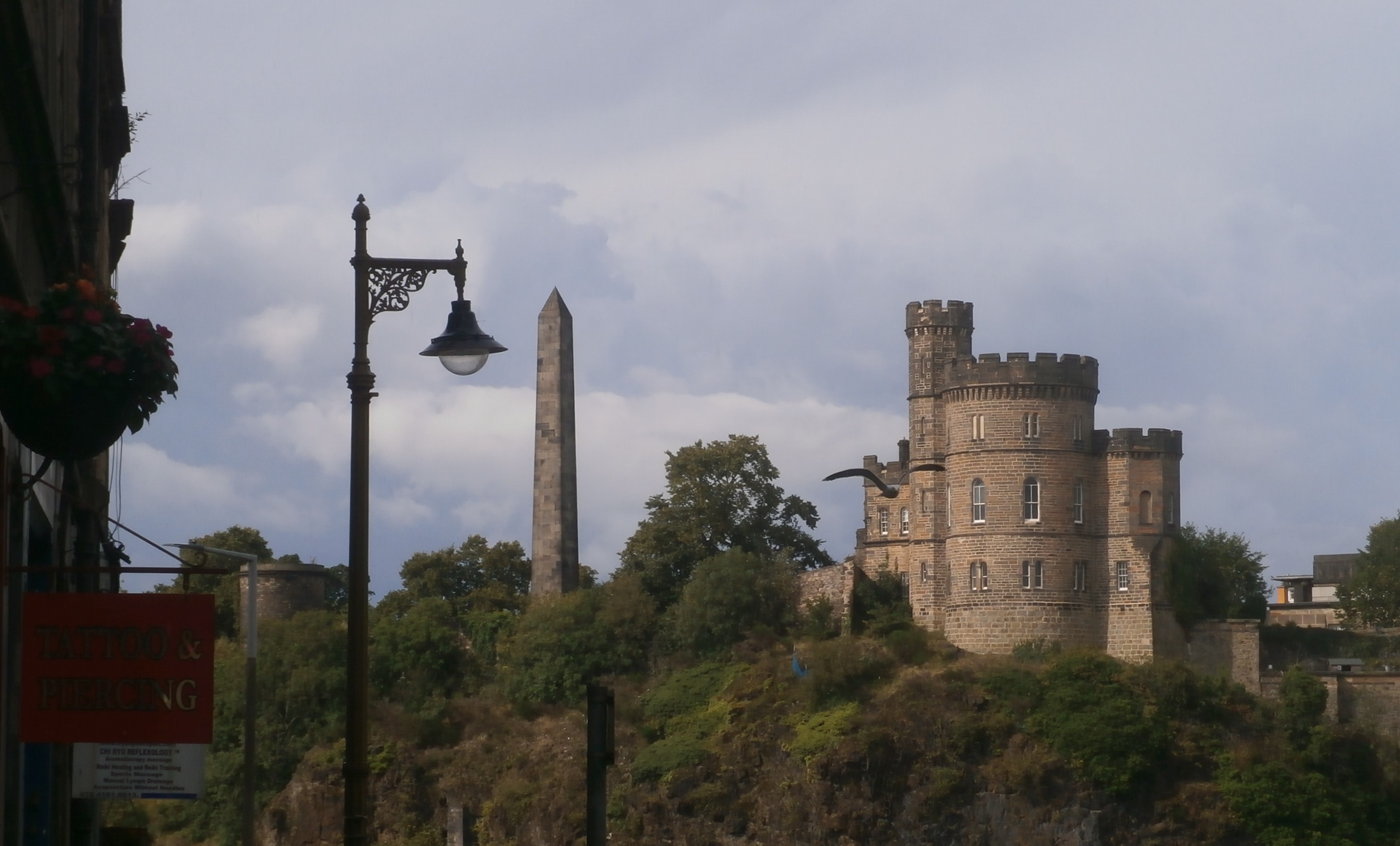 Photo of Edinburgh - Obelisk and castellar building