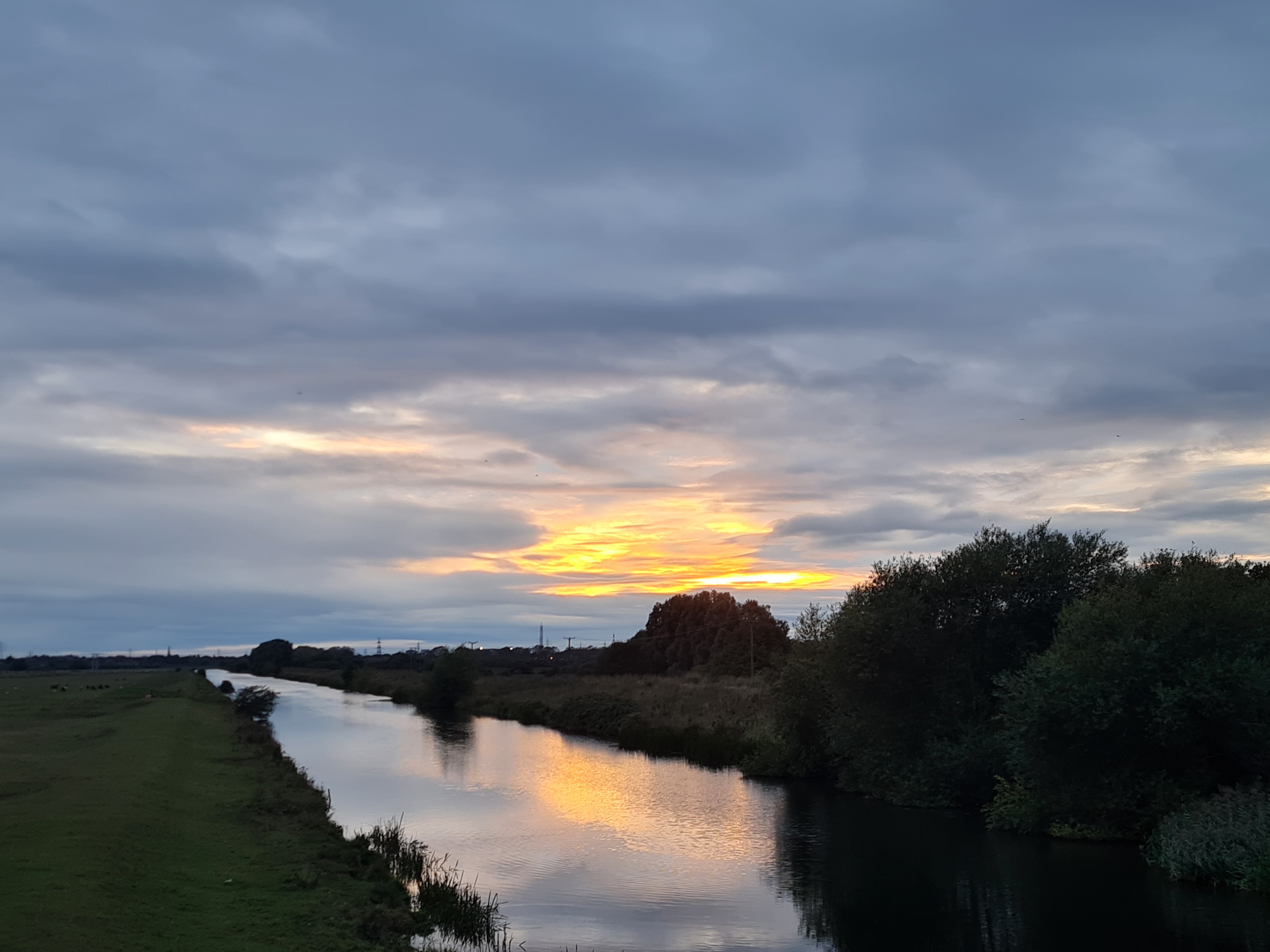 Photo of Whittlesey to Peterborough cyclepath - Sunset over River Nene from Shanks Millennium Bridge
