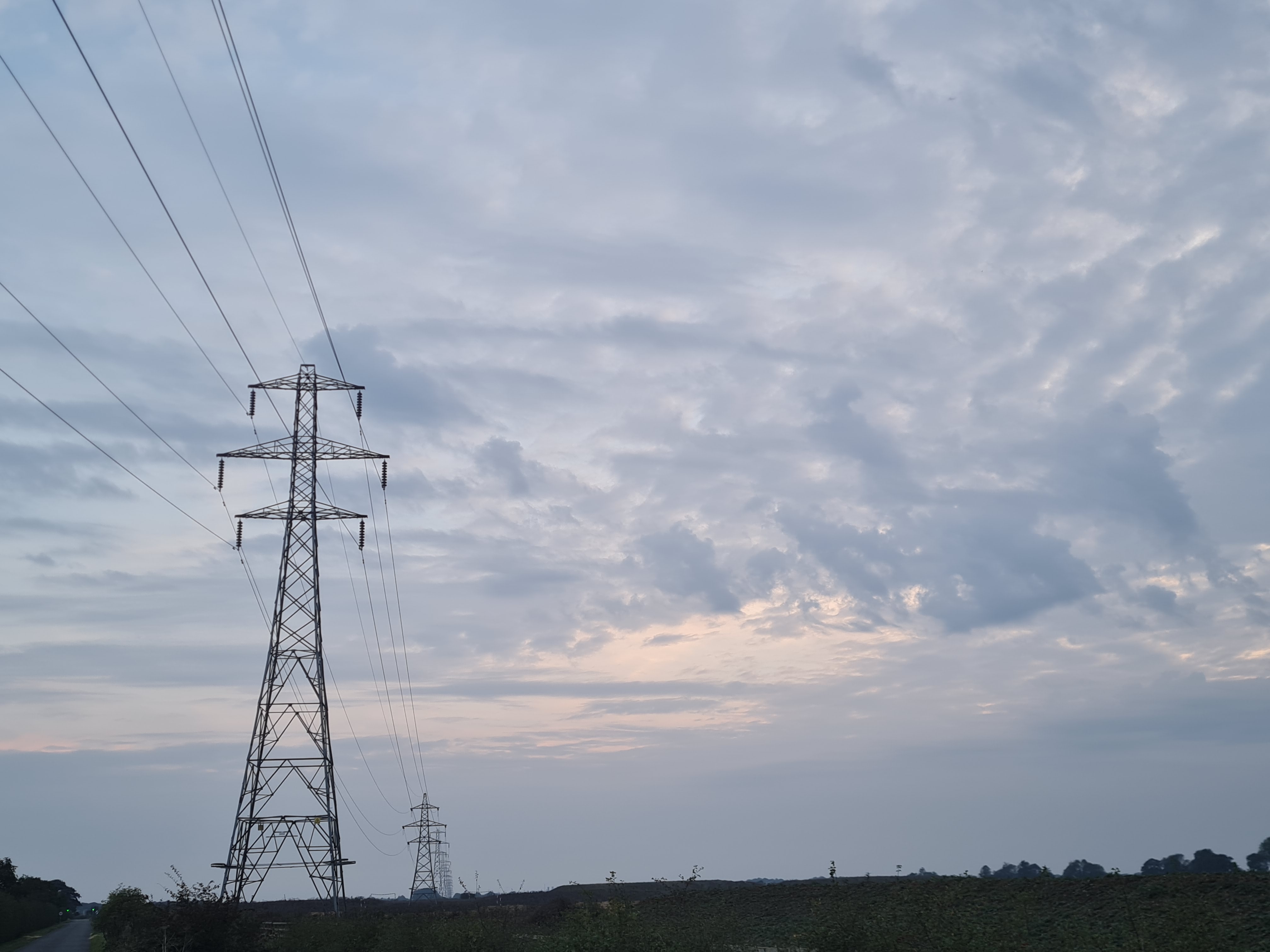 Photo of Willow Hall Lane, Peterborough - Pylons and clouds at dusk