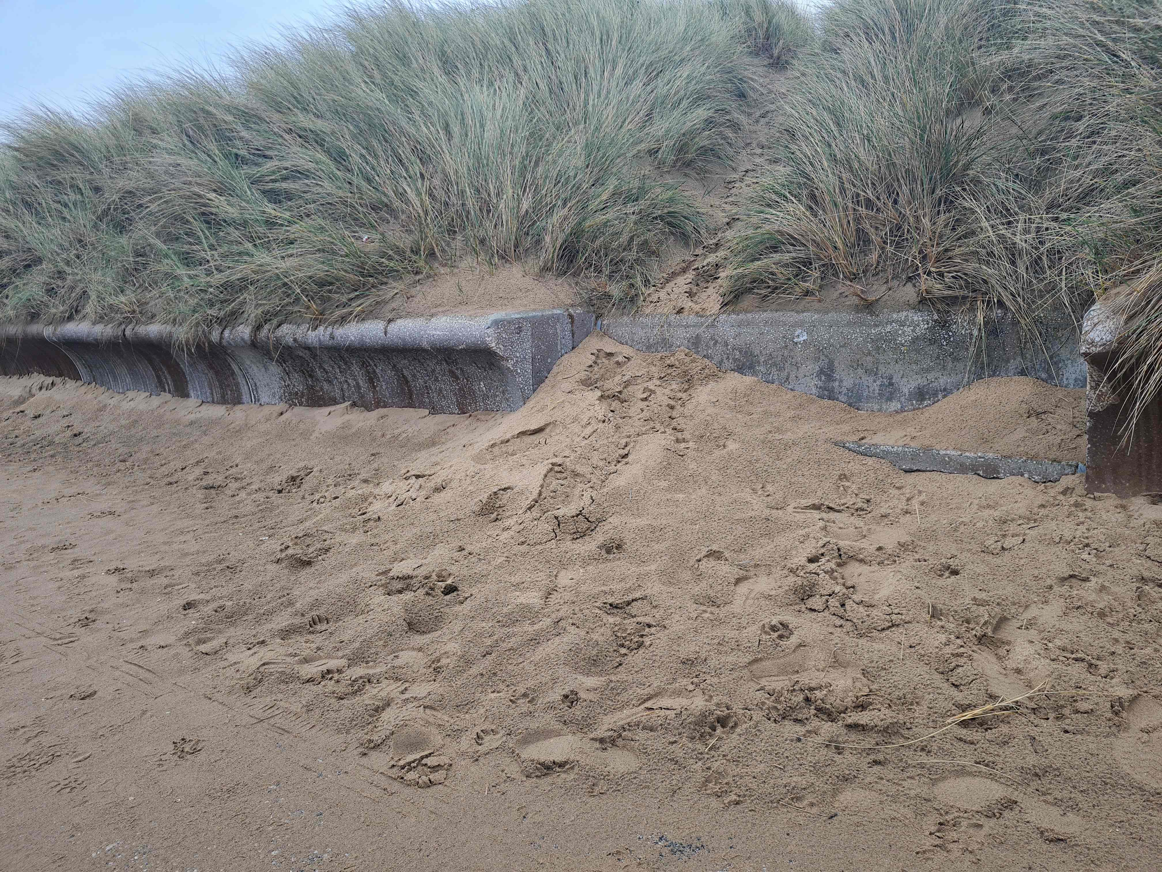 Photo of Sand covering steps on North Wales coastal path between Rhyl and Prestatyn