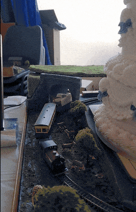 Train running around the wedding cake