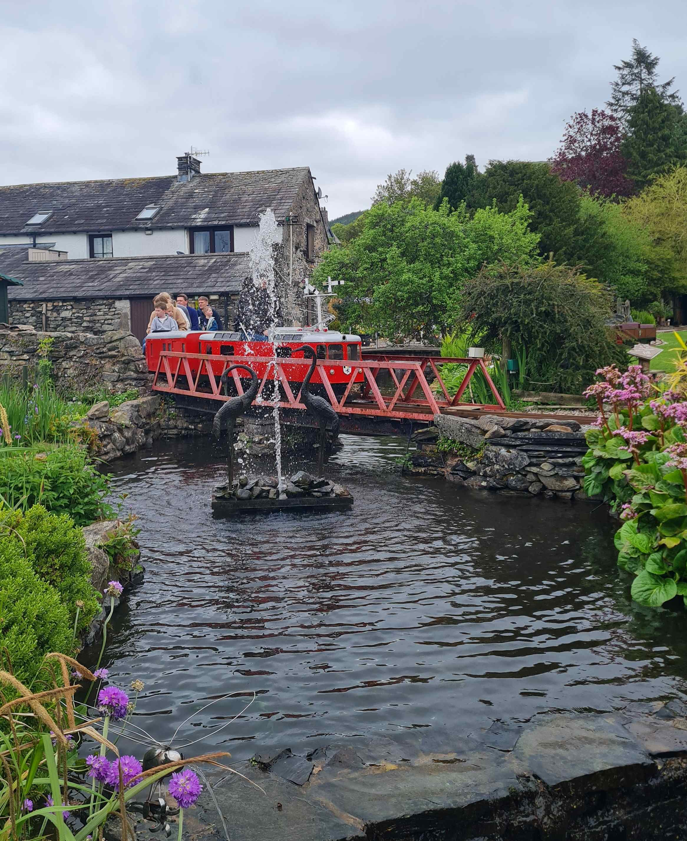 Photo of train going over bridge at Millerbeck Light Railway